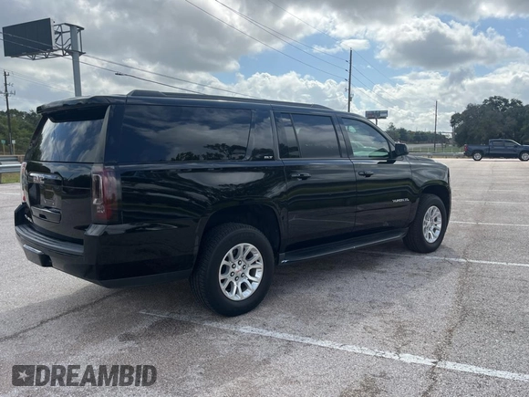 2020 GMC Yukon XL SLT with VIN 1GKS1GKC0LR288614, listed as a Copart auction lot 80264004 with 112,403 mi miles and Clean Title. Bid and sale history available at carsss.com. Image 4.
