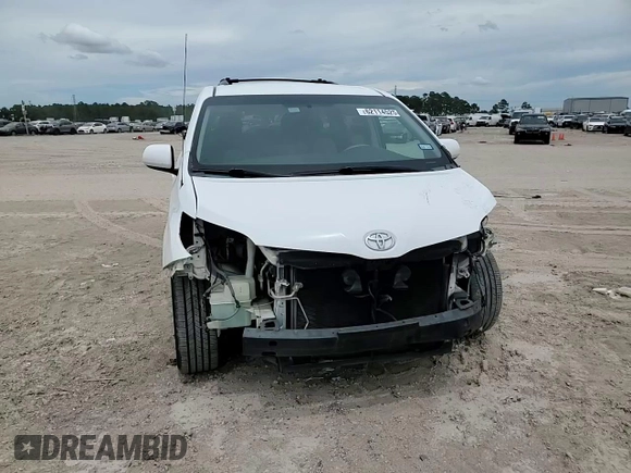 2014 Toyota Sienna LE AAS with VIN 5TDKK3DC1ES424249, listed as a Copart auction lot 62114525 with 193,301 mi miles and Salvage title. Bid and sale history available at DreamBid. Image 15.
