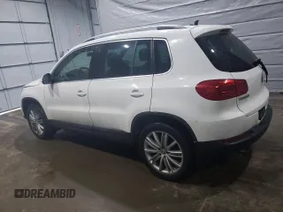 2013 Volkswagen Tiguan SEL with VIN WVGBV3AX2DW058147, listed as a Copart auction lot 47110285 with 156,145 mi miles and Salvage Title. Bid and sale history available at DreamBid. Image 2.