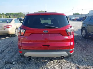 2017 Ford Escape SE z VIN 1FMCU0GD9HUF01849, wystawiony jako IAAI lot #42410230 z przebiegiem 177 423 mil mil oraz . Historia ofert i sprzedaży dostępna na DreamBid. Obrazek 16.