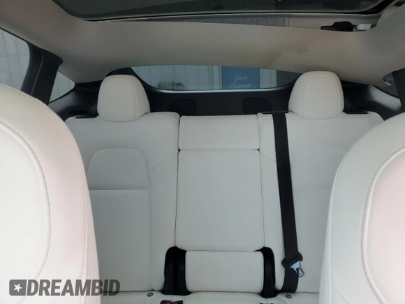2021 Tesla Model Y Long Range with VIN 5YJYGDEE5MF203130, listed as a Copart auction lot 54642795 with 73,663 mi miles and Non Repairable. Bid and sale history available at DreamBid. Image 10.