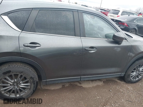 2017 Mazda CX-5 Touring with VIN JM3KFACL3H0148312, listed as a IAAI auction lot 41844634 with 68,534 mi miles and . Bid and sale history available at carsss.com. Image 13.