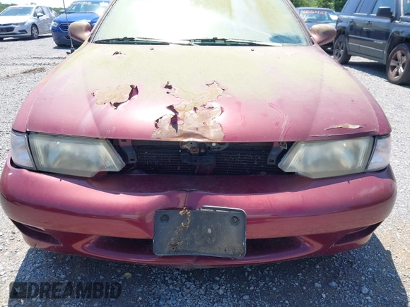 1999 Nissan Sentra XE with VIN 3N1AB41D0XL107458, listed as a IAAI auction lot 42536232 with 119,701 mi miles and . Bid and sale history available at DreamBid. Image 12.