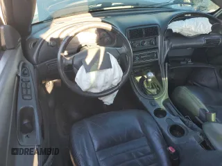 2004 Ford Mustang GT Deluxe z VIN 1FAFP45X64F201980, wystawiony jako Copart lot #82650864 z przebiegiem Nie podano mil oraz Szkoda całkowita • Salvage title. Historia ofert i sprzedaży dostępna na DreamBid. Obrazek 8.