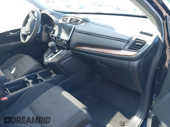 2019 Honda CR-V EX with VIN 2HKRW2H5XKH674504, listed as a IAAI auction lot 41823838 with 104,281 mi miles. Bid and sale history available at carsss.com. Image 4.