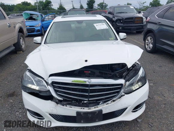 2014 Mercedes-Benz E 350 Luxury with VIN WDDHF8JB5EB040219, listed as a IAAI auction lot 42771799 with 65,454 mi miles and . Bid and sale history available at DreamBid. Image 12.