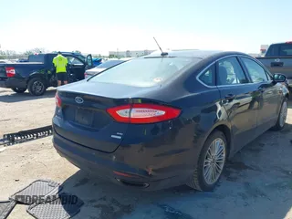 2015 Ford Fusion SE z VIN 3FA6P0H92FR247432, wystawiony jako IAAI lot #42044461 z przebiegiem 148 616 mil mil oraz . Historia ofert i sprzedaży dostępna na DreamBid. Obrazek 4.