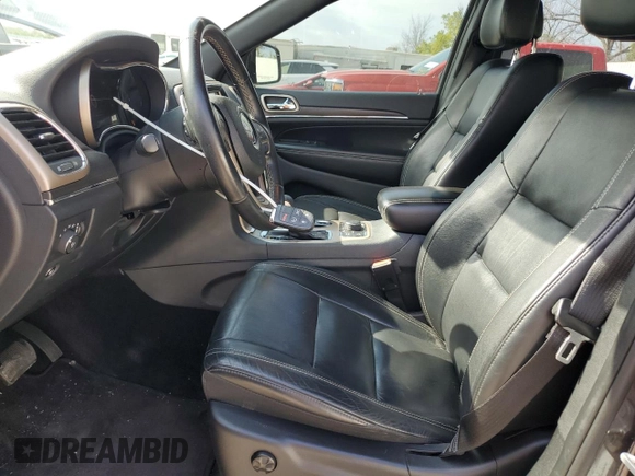 2016 Jeep Grand Cherokee Limited 75th Anniversary with VIN 1C4RJFBG3GC303588, listed as a Copart auction lot 53254915 with 130,660 mi miles and Salvage Title. Bid and sale history available at DreamBid. Image 7.