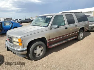 1998 GMC Suburban with VIN 1GKFK16RXWJ721305, listed as a Copart auction lot 64112165 with 197,756 mi miles and Clean title. Bid and sale history available at DreamBid. Image 1.