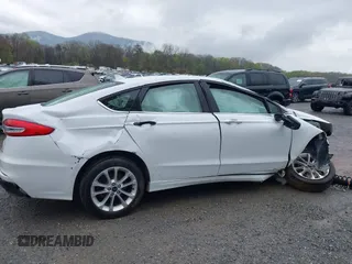 2020 Ford Fusion SE z VIN 3FA6P0LU2LR219671, wystawiony jako IAAI lot #41996821 z przebiegiem Nie podano mil oraz . Historia ofert i sprzedaży dostępna na DreamBid. Obrazek 15.