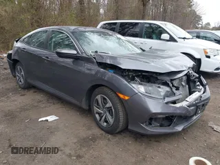 2020 Honda Civic LX z VIN 2HGFC2F66LH556906, wystawiony jako IAAI lot #42018760 z przebiegiem 58 706 mil mil oraz . Historia ofert i sprzedaży dostępna na DreamBid. Obrazek 1.