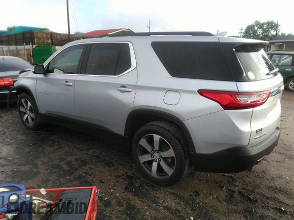 2021 Chevrolet Traverse LT with VIN 1GNERHKW6MJ157311, listed as a IAAI auction lot 42256458 with 97,635 mi miles and . Bid and sale history available at DreamBid. Image 3.