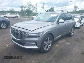 2023 Genesis GV80 with VIN KMUHCESCXPU133511, listed as a IAAI auction lot 42486556 with 38,988 mi miles and . Bid and sale history available at DreamBid. Image 2.
