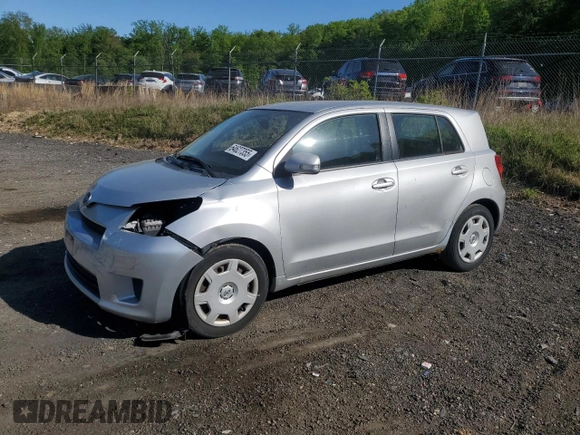 2008 Scion xD z VIN JTKKU10408J025968, wystawiony jako Copart lot #54627355 z przebiegiem 144 133 mil mil oraz Szkoda całkowita • Salvage title. Historia ofert i sprzedaży dostępna na DreamBid. Obrazek 1.