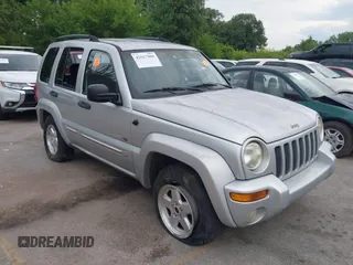 2002 Jeep Liberty Limited with VIN 1J4GL58K42W232295, listed as a IAAI auction lot 42617908 with 215,611 mi miles and . Bid and sale history available at DreamBid. Image 1.