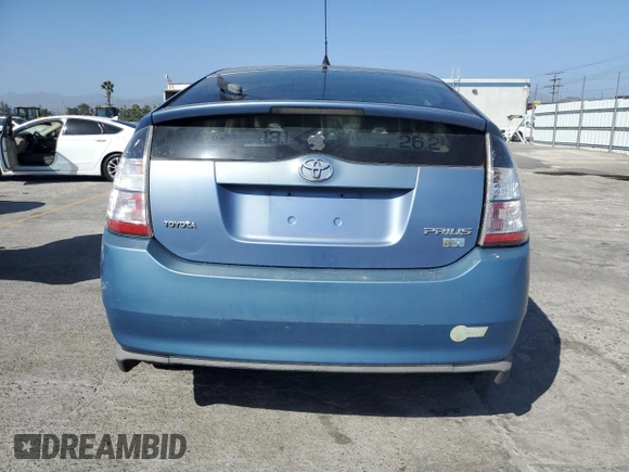 2005 Toyota Prius z VIN JTDKB20U457028965, wystawiony jako Copart lot #57987625 z przebiegiem Nie podano mil oraz Szkoda całkowita • Salvage title. Historia ofert i sprzedaży dostępna na DreamBid. Obrazek 6.