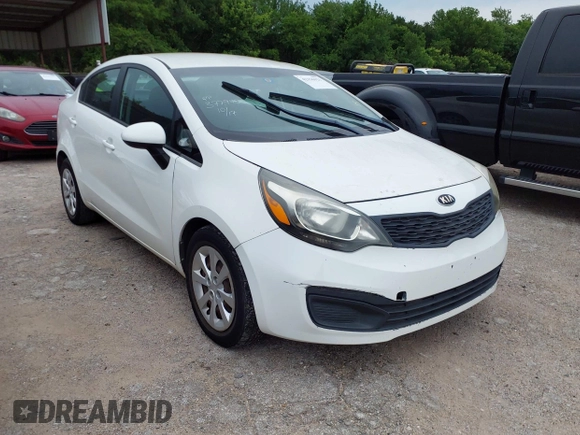 2014 Kia Rio LX with VIN KNADM4A3XE6384733, listed as a IAAI auction lot 42196921 with 153,084 mi miles and . Bid and sale history available at DreamBid. Image 1.