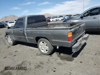 1987 Toyota Pickup with VIN JT4RN50R5H0228706, listed as a Copart auction lot 50639045 with 296,043 mi miles and Salvage Title. Bid and sale history available at DreamBid. Image 2.