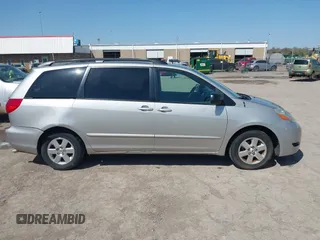2009 Toyota Sienna CE with VIN 5TDZK23C19S263613, listed as a IAAI auction lot 41983708 with 162,395 mi miles. Bid and sale history available at carsss.com. Image 13.