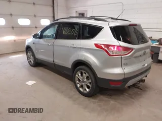 2013 Ford Escape SE with VIN 1FMCU9G99DUA02866, listed as a IAAI auction lot 42087543 with 260,585 mi miles. Bid and sale history available at carsss.com. Image 3.