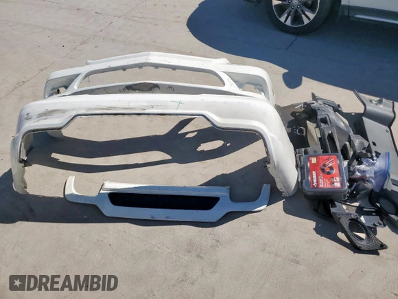 2009 Mercedes-Benz SL 550 with VIN WDBSK71F69F147589, listed as a Copart auction lot 65976995 with 77,387 mi miles and Salvage title. Bid and sale history available at DreamBid. Image 12.
