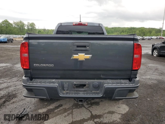 2015 Chevrolet Colorado 4WD Z71 with VIN 1GCGTCE35F1272962, listed as a Copart auction lot 55525325 with 129,701 mi miles and Salvage title. Bid and sale history available at DreamBid. Image 6.