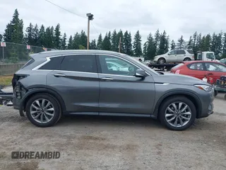 2020 Infiniti QX50 Luxe z VIN 3PCAJ5M1XLF117060, wystawiony jako IAAI lot #42500252 z przebiegiem 63 533 mil mil oraz . Historia ofert i sprzedaży dostępna na DreamBid. Obrazek 14.