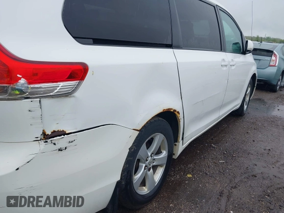 2012 Toyota Sienna LE AAS with VIN 5TDKK3DC3CS208853, listed as a IAAI auction lot 42205012 with 197,286 mi miles. Bid and sale history available at carsss.com. Image 6.