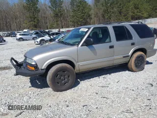 2004 Chevrolet Blazer LS z VIN 1GNDT13X54K166622, wystawiony jako Copart lot #50248605 z przebiegiem 198 301 mil mil oraz Szkoda całkowita • Salvage title. Historia ofert i sprzedaży dostępna na DreamBid. Obrazek 1.