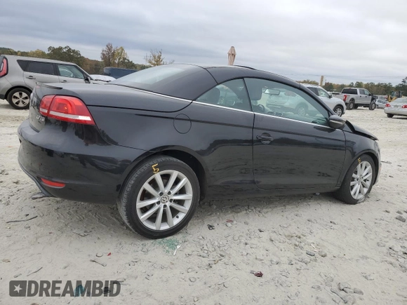 2015 Volkswagen Eos Komfort with VIN WVWBW8AH6FV005693, listed as a Copart auction lot 79176614 with 106,556 mi miles and Salvage Title. Bid and sale history available at DreamBid. Image 3.
