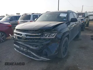 2021 Volkswagen Atlas SE with VIN 1V2WE2CA3MC240934, listed as a IAAI auction lot 41739347 with 44,485 mi miles and . Bid and sale history available at DreamBid. Image 2.