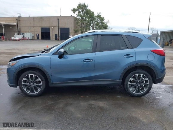 2016 Mazda CX-5 Grand Touring with VIN JM3KE4DY9G0726782, listed as a IAAI auction lot 41720512 with NaN miles. Bid and sale history available at carsss.com. Image 14.
