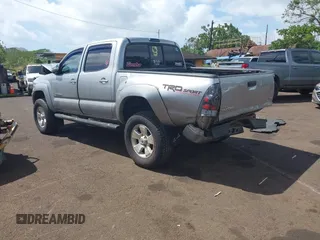 2014 Toyota Tacoma with VIN 3TMLU4EN3EM159080, listed as a IAAI auction lot 41809259 with 113,950 mi miles and . Bid and sale history available at DreamBid. Image 3.