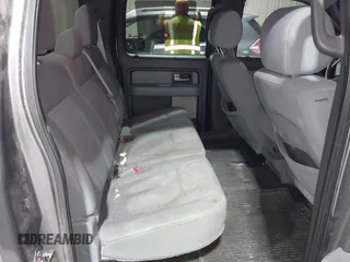 2014 Ford F-150 XL with VIN 1FTFW1EF5EFB71651, listed as a IAAI auction lot 42051456 with 143,945 mi miles and . Bid and sale history available at DreamBid. Image 8.