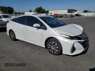 2021 Toyota Prius LE with VIN JTDKAMFP6M3191509, listed as a Copart auction lot 60153785 with 112,625 mi miles and Salvage title. Bid and sale history available at DreamBid. Image 4.