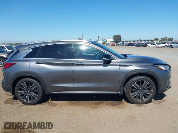 2021 Infiniti QX50 Luxe z VIN 3PCAJ5BA2MF111323, wystawiony jako IAAI lot #42218711 z przebiegiem 27 864 mil mil oraz . Historia ofert i sprzedaży dostępna na DreamBid. Obrazek 13.