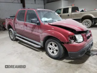 2005 Ford Explorer Sport Trac XLS with VIN 1FMZU77KX5UA12440, listed as a Copart auction lot 42966185 with 209,959 mi miles and Salvage title. Bid and sale history available at DreamBid. Image 4.