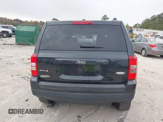 2014 Jeep Patriot Latitude with VIN 1C4NJRFB3ED551622, listed as a IAAI auction lot 40917179 with 109,856 mi miles. Bid and sale history available at carsss.com. Image 16.