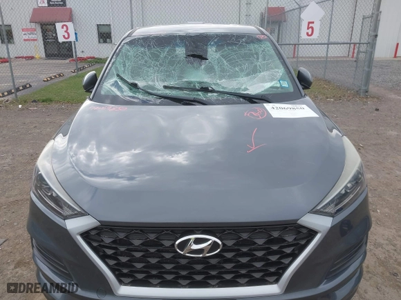 2019 Hyundai Tucson SE with VIN KM8J23A48KU923772, listed as a IAAI auction lot 42069850 with 57,692 mi miles. Bid and sale history available at carsss.com. Image 13.