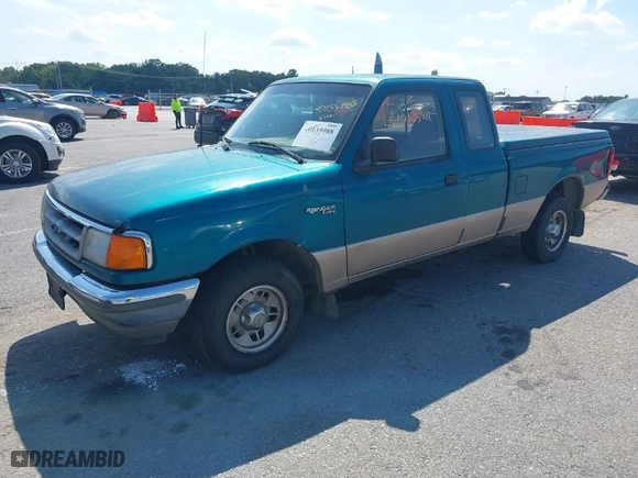 1996 Ford Ranger XL with VIN 1FTCR14U2TPB41329, listed as a IAAI auction lot 40135988 with 119,381 mi miles. Bid and sale history available at carsss.com. Image 2.