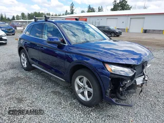 2021 Audi Q5 Premium z VIN WA1AAAFY6M2023257, wystawiony jako IAAI lot #42327039 z przebiegiem 21 736 mil mil oraz . Historia ofert i sprzedaży dostępna na DreamBid. Obrazek 1.