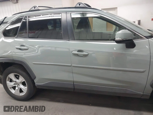 2019 Toyota RAV4 XLE with VIN JTMP1RFV2KD028137, listed as a IAAI auction lot 41931454 with 88,998 mi miles and . Bid and sale history available at DreamBid. Image 13.
