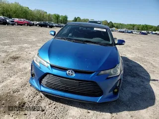2016 Scion tC z VIN JTKJF5C75GJ022534, wystawiony jako Copart lot #52254005 z przebiegiem 103 812 mil mil oraz Szkoda całkowita • Salvage title. Historia ofert i sprzedaży dostępna na DreamBid. Obrazek 11.