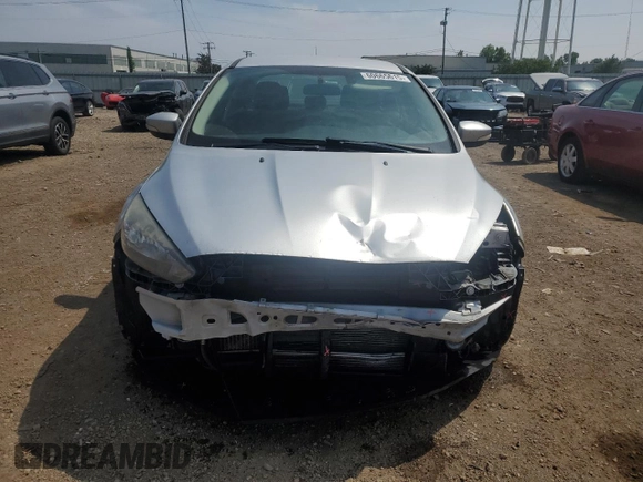 2017 Ford Focus SE with VIN 1FADP3FE7HL290271, listed as a Copart auction lot 60665615 with 130,409 mi miles and Salvage title. Bid and sale history available at DreamBid. Image 5.