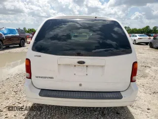 2003 Ford Windstar z VIN 2FMZA50493BA32884, wystawiony jako Copart lot #61452125 z przebiegiem 103 295 mil mil oraz Czysty tytuł • Clean title. Historia ofert i sprzedaży dostępna na DreamBid. Obrazek 6.