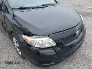 2010 Toyota Corolla with VIN 1NXBU4EE1AZ285449, listed as a IAAI auction lot 42040668 with 121,404 mi miles and . Bid and sale history available at carsss.com. Image 17.