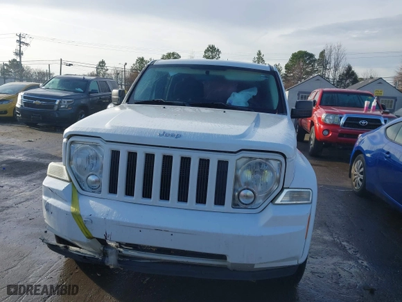 2011 Jeep Liberty Sport with VIN 1J4PP2GK7BW586705, listed as a IAAI auction lot 41110560 with 202,848 mi miles. Bid and sale history available at carsss.com. Image 12.