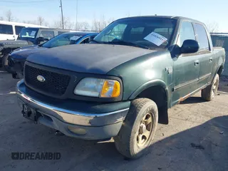 2002 Ford F-150 XLT with VIN 1FTRW08L12KB71710, listed as a IAAI auction lot 41826511 with 1 mi miles. Bid and sale history available at carsss.com. Image 6.