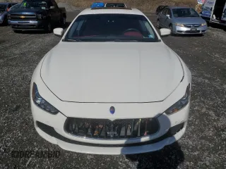 2017 Maserati Ghibli z VIN ZAM57XSA5H1216203, wystawiony jako Copart lot #51991055 z przebiegiem 70 203 mil mil oraz Szkody całkowita. Historia ofert i sprzedaży dostępna na DreamBid. Obrazek 5.