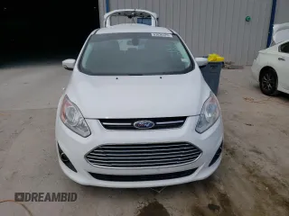 2015 Ford C-Max Energi SEL with VIN 1FADP5CU9FL109434, listed as a Copart auction lot 63836373 with 77,260 mi miles. Bid and sale history available at carsss.com. Image 5.